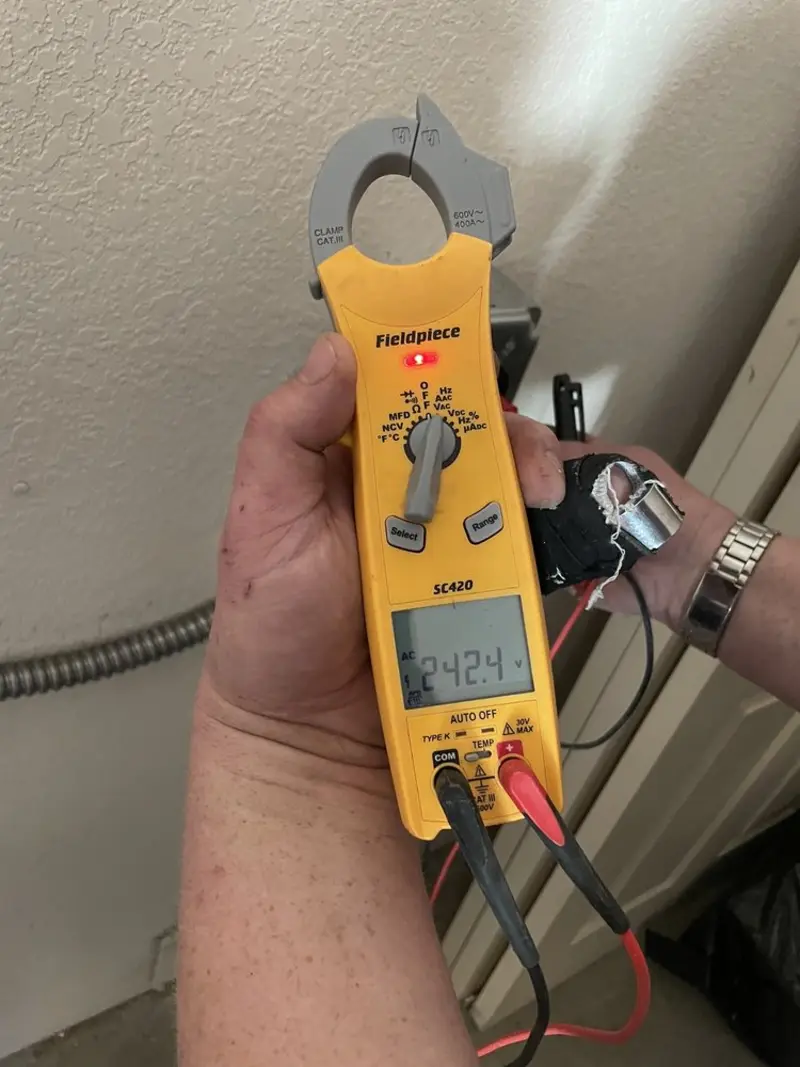 Voltage testing with clamp meter during Generator Installation in Hadley